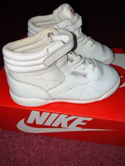Kids white reeboks size 10