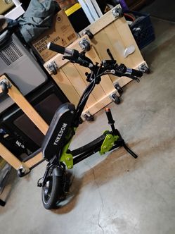 Freedom electric wheelchair tractor attachment