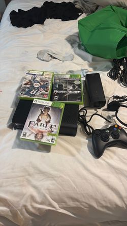 Xbox 360 with games and controller
