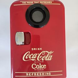 Coca-Cola 4L Portable Mini Fridge with a built-in Bluetooth speaker