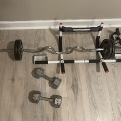 15,25,30 Pound Weights and EZ bar 