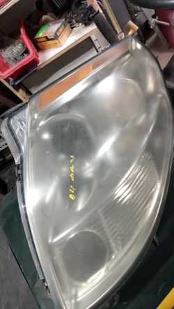 04 Nissan max headlight