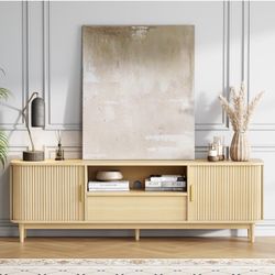 Modern Fluted TV Stand for TVs Up to 80 inches, 69" Entertainment Center with Storage Drawer, TV Console with Sliding Doors and Adjustable Shelves, Me