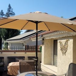 9ft Tilt Umbrella In New Condition No Rips Tears Or Tears Bought Last Yr . Lights May Need New Solar Battery Not Sure
