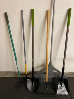 Assorted garden tools-shovels, rake, hoe