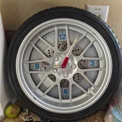 Clock. Beautiful Wall Clock, Like A Tyre. For Car Enthusiastic 