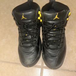 jordan 12 black taxi