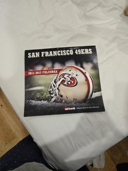 49ers Calendar Signed By Marshawn Lynch