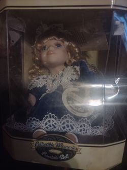 Music box collector doll
