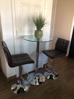 Table and burgundy stools