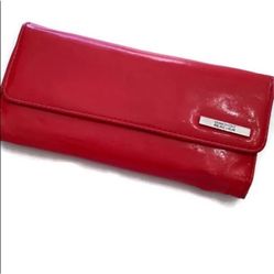 Reaction red faux patent leather wallet. Trifold with magnetic closure. 8”x4” zipper