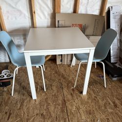 Table And Two Chairs 