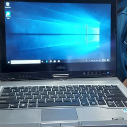 Fujitsu T902.  I 7  Windows 10 Home 