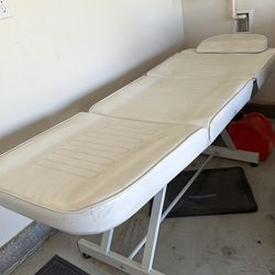 Massage table