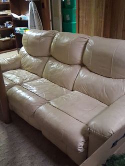 Cream color double reclining  on both ends Sofa