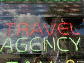 Neón Sign Travel Agency