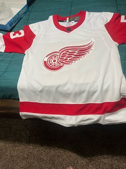 Red wings signed jersey