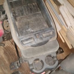 99-06 chevy/ GMC  front middle seat console 