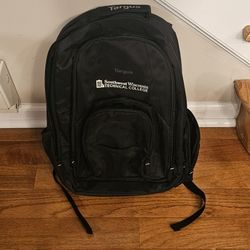 Targus briefcase / knapsack backpack, many zippers and pockets are included all in Excellent condition.