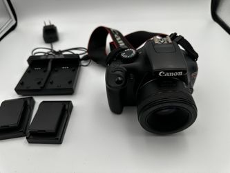 Canon EOS Rebel T3 Camera With Three Batteries And Charger