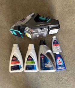 Carpet cleaner + supplies