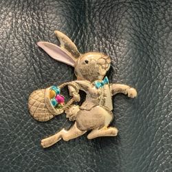 Easter Bunny brooch with  Easter egg basket  1.75”x1.75” Material: rhinestones and alloy 