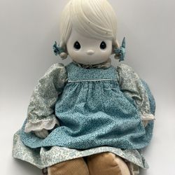Precious Moment 1983 “Mother See Dear”. The Doll has a porcelain head & hands.