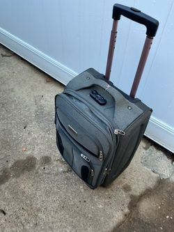 A carryon suitcase in pretty good condition