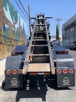 Roll off trailer rocket launcher