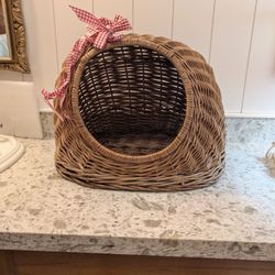 small wicker pet bed.