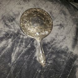 Vintage silver plated hand mirror for women $400