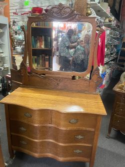 Antique oak dresser with mirror 44 by 33 by 21 then 70 to the top of the mirror
