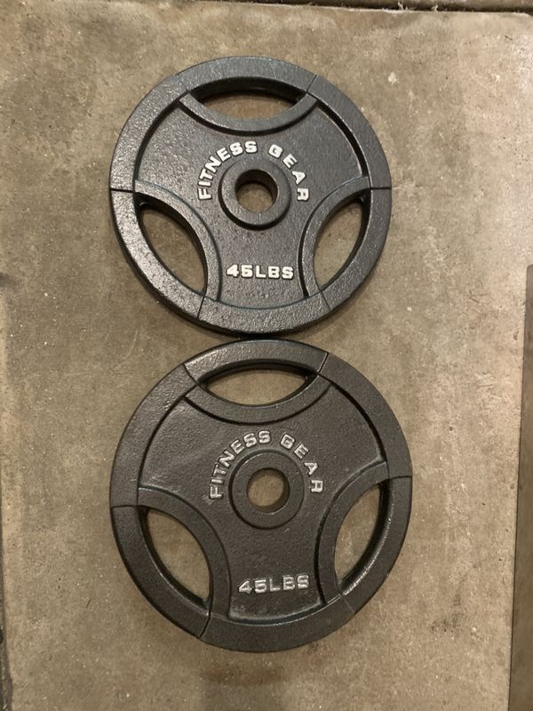 2 x 45 lbs Olympic weight plates for Sale in Bartlett, IL OfferUp