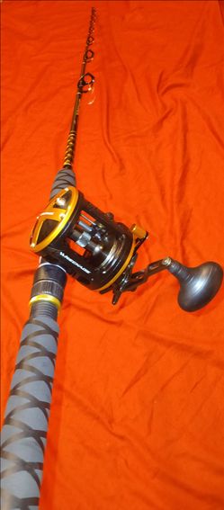1) New Black& Gold series 30LW Tsunami  on matching Custom grip Tsunami Wreckage graphite 6'6 combo rod