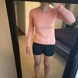 Pink/Orange/Peach Lululemon Long sleeve sweat shirt