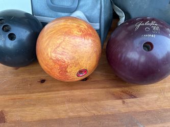 Antique bowling balls  orange black widow, galaxie300, 4 finger bunswick