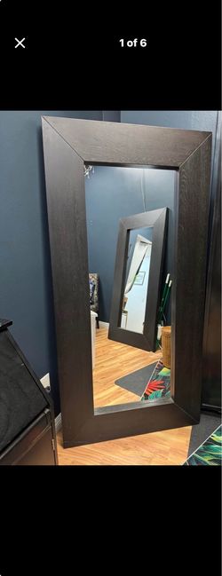 Black leaning mirrors