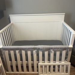 Delta children’s 4-in-1 convertible crib to toddler bed to daybed with trundle and mattress white 