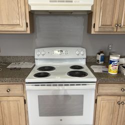 White GE Standing Electric Range Oven