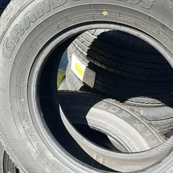 Hemisphere 235/65R18 H/T tires — set of 4