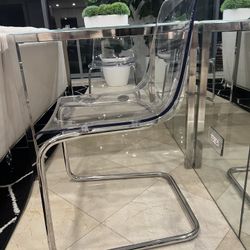 Two Clear Chrome Plated Chairs