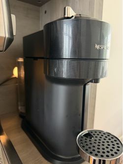 Nespresso Vertuo coffee machine with milk frother
