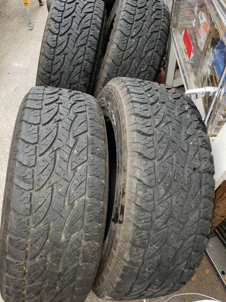 265/65/17P Dueler AT. SUV. Great tires.