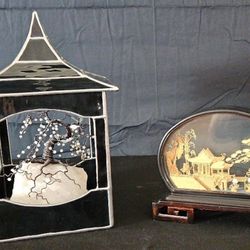 Mixed media decorative art pieces: stained glass pagoda lantern and cork carving diorama with Asian motif