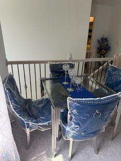 Decorative Glass Table with 4 Cushioned chairs