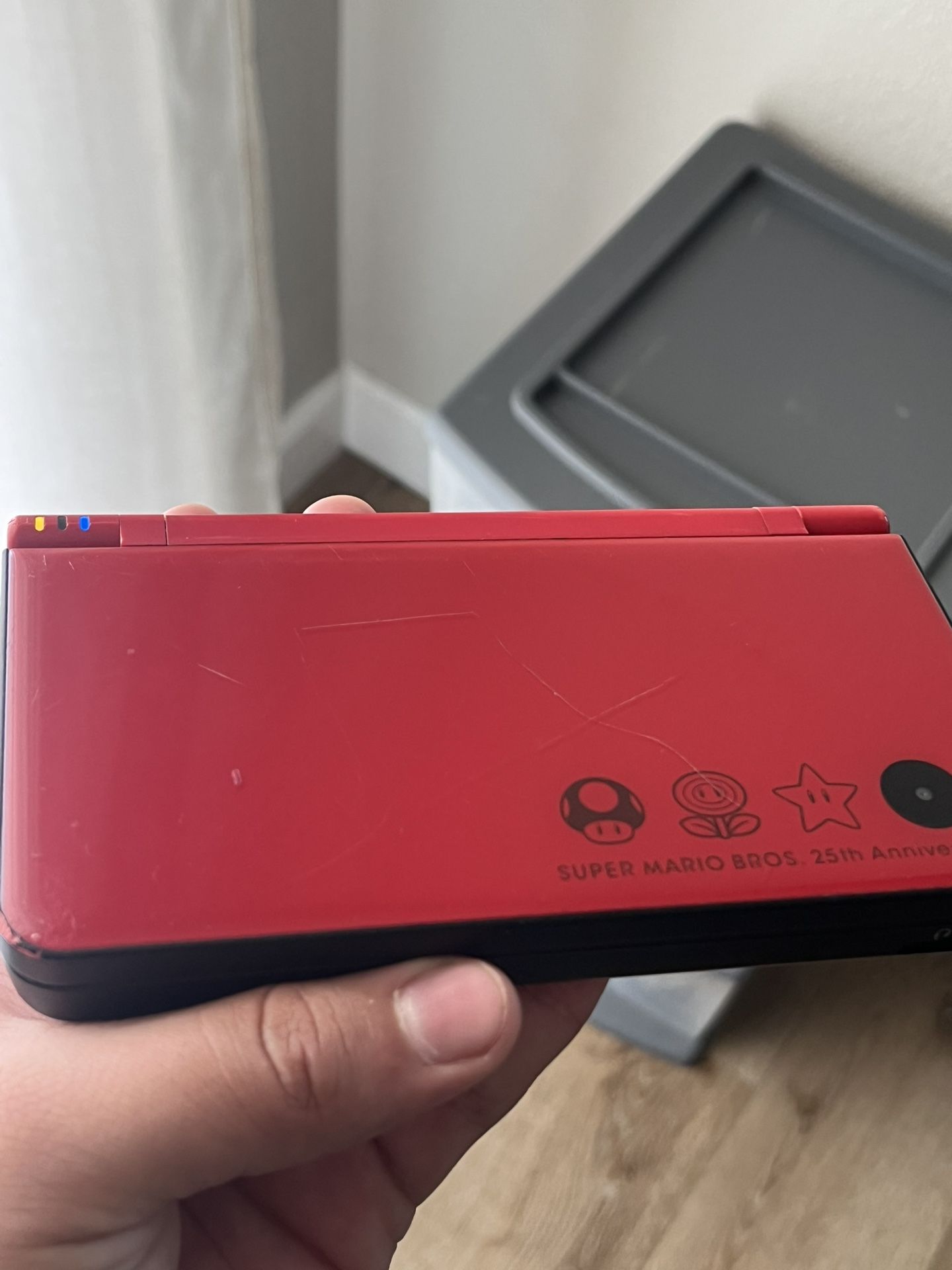 super mario bros 25th DSI XL with games loaded on