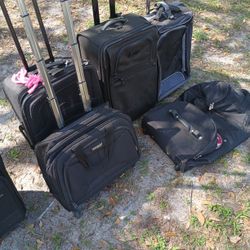 LOTS OF NICE PULL ALONG LUGGAGE 