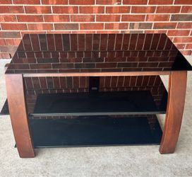 Wood and Black Glass TV Stand