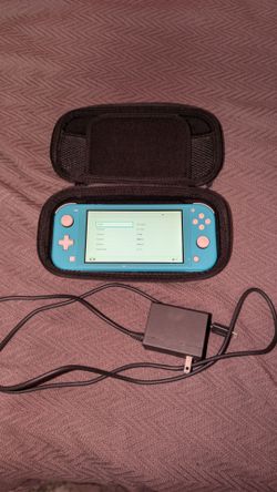 Switch lite w/ 128gb micro sd card, installed screen protector, case, and charger