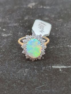 14Kt White Gold Women's Ring Apx 6 Grams w/ Apx .50CT of Small Diamonds & Opal Stone
